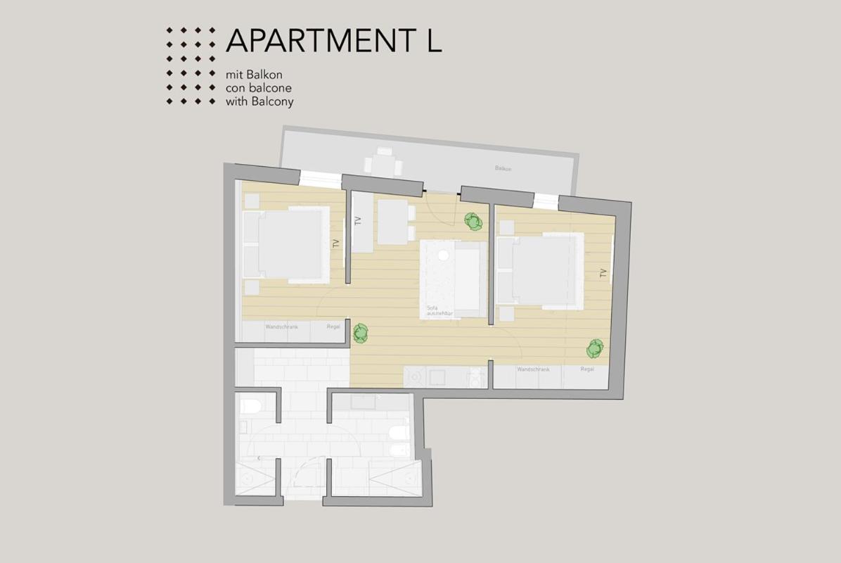 Hofergut Suites & Apartments Riscone Pokoj fotografie
